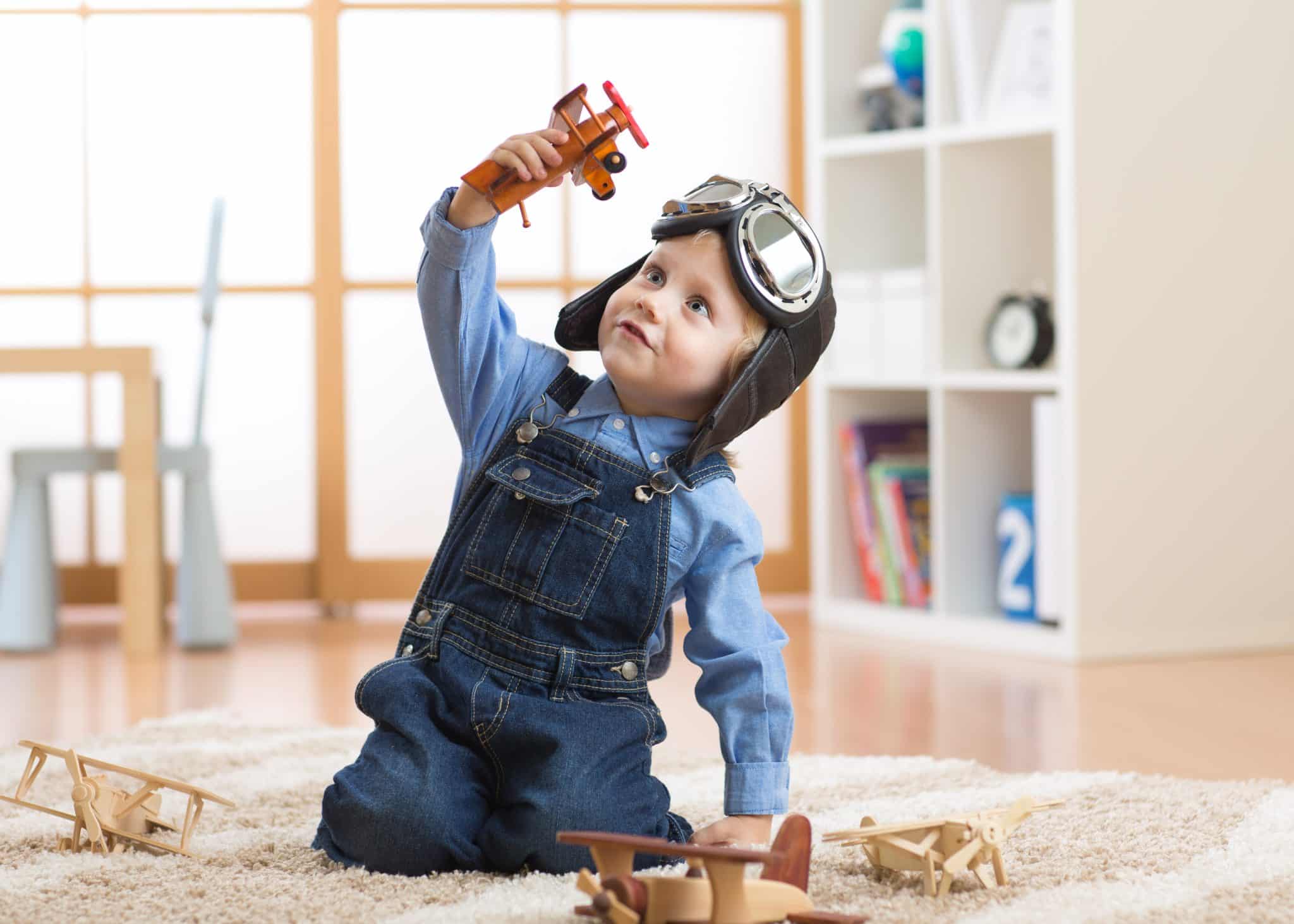 Happy,Child,Toddler,Boy,Playing,With,Toy,Airplane,And,Dreaming