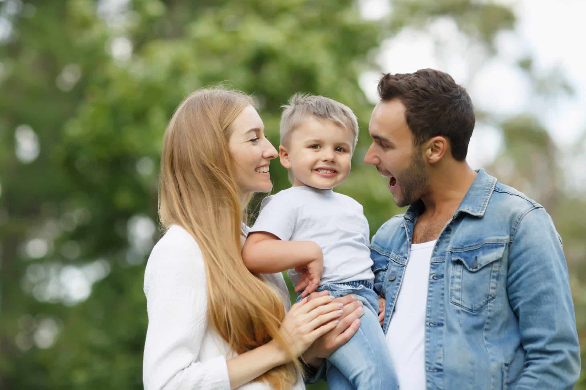 Close-up,Of,Family,-,Mom,And,Dad,Look,At,Their